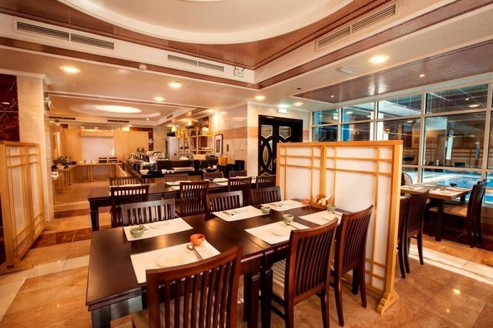 Imagen del bar/restaurante del Hotel Golden Tulip Media. Foto 4