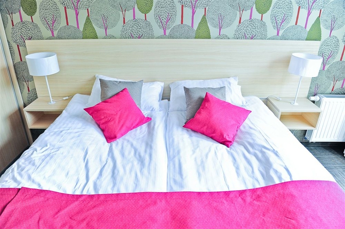 Imagen de la habitación del Hotel Golden Tulip Miedzyzdroje Residence. Foto 5