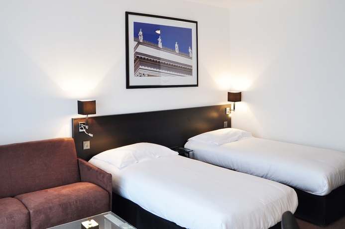 Imagen de la habitación del Hotel Golden Tulip Nantes Carquefou Suites. Foto 7