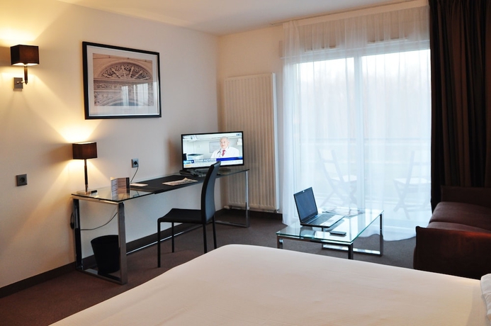 Imagen de la habitación del Hotel Golden Tulip Nantes Carquefou Suites. Foto 16