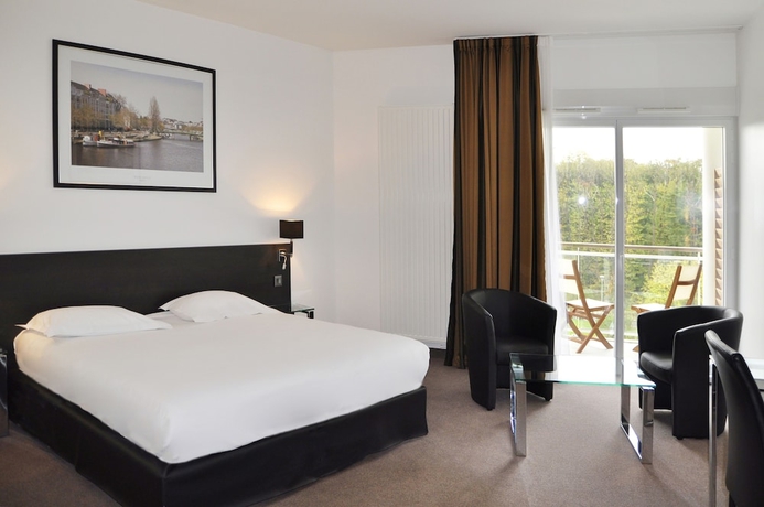 Imagen de la habitación del Hotel Golden Tulip Nantes Carquefou Suites. Foto 17
