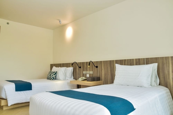 Imagen de la habitación del Hotel Golden Tulip Pattaya Beach Resort. Foto 14