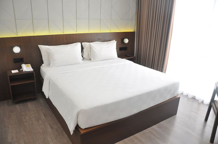 Imagen de la habitación del Hotel Golden Tulip Pontianak. Foto 2
