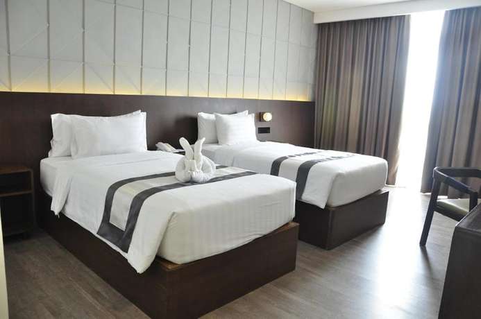 Imagen de la habitación del Hotel Golden Tulip Pontianak. Foto 6