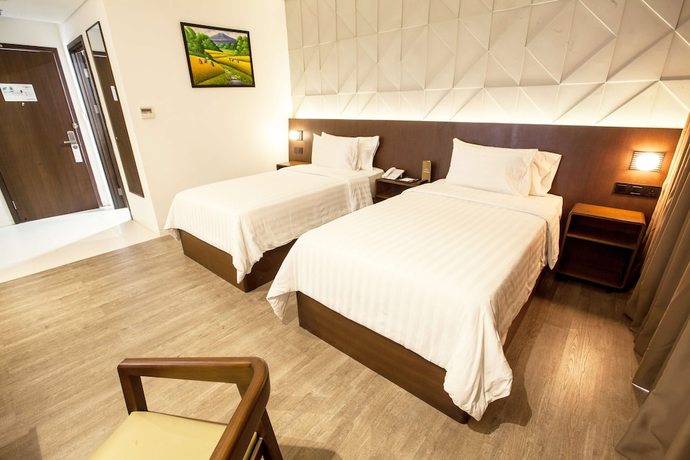 Imagen de la habitación del Hotel Golden Tulip Pontianak. Foto 14