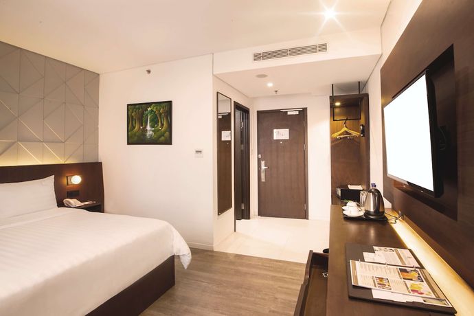 Imagen de la habitación del Hotel Golden Tulip Pontianak. Foto 17