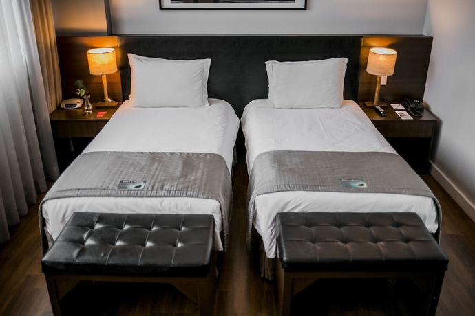 Imagen de la habitación del Hotel Golden Tulip Porto Vit&oacute;ria. Foto 13