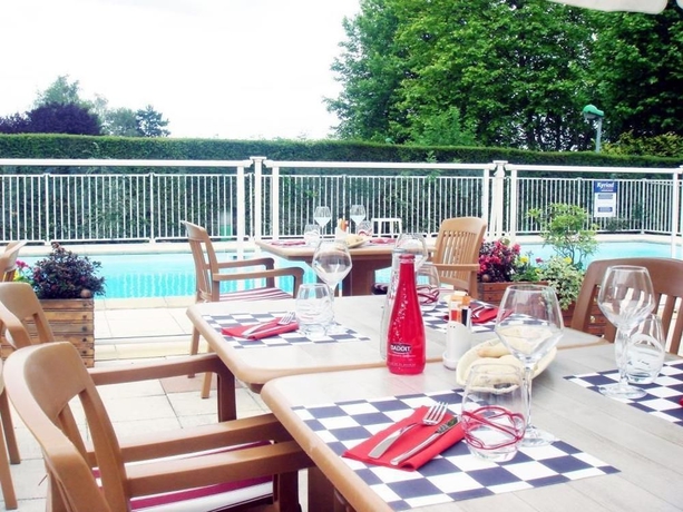 Imagen del bar/restaurante del Hotel Golden Tulip Roissy Saint Witz. Foto 4