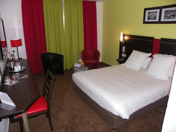 Imagen de la habitación del Hotel Golden Tulip Roissy Saint Witz. Foto 7