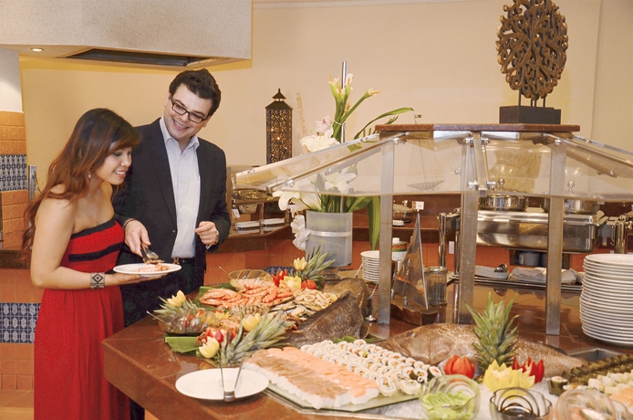 Imagen del bar/restaurante del Hotel Golden Tulip Seeb. Foto 5