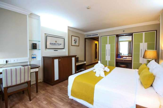 Imagen de la habitación del Hotel Golden Tulip Sovereign Bangkok. Foto 9