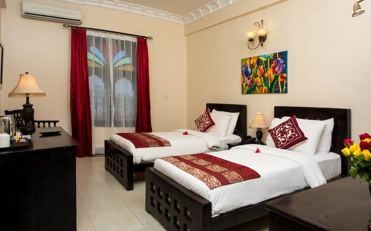 Imagen de la habitación del Hotel Golden Tulip Stonetown Boutique. Foto 5