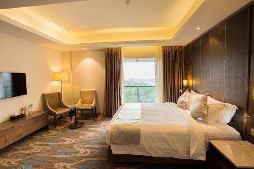 Imagen de la habitación del Hotel Golden Tulip - The GrandMark Dhaka. Foto 6