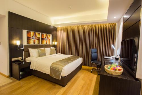 Imagen de la habitación del Hotel Golden Tulip - The GrandMark Dhaka. Foto 7