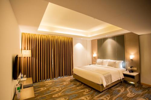 Imagen de la habitación del Hotel Golden Tulip - The GrandMark Dhaka. Foto 8
