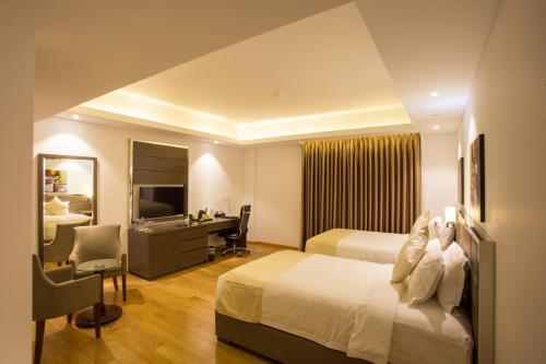 Imagen de la habitación del Hotel Golden Tulip - The GrandMark Dhaka. Foto 9