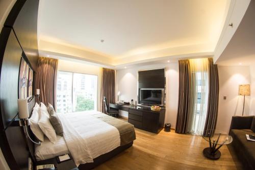 Imagen de la habitación del Hotel Golden Tulip - The GrandMark Dhaka. Foto 10