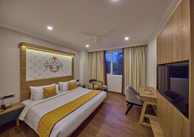 Imagen de la habitación del Hotel Golden Tulip Tirupati. Foto 20