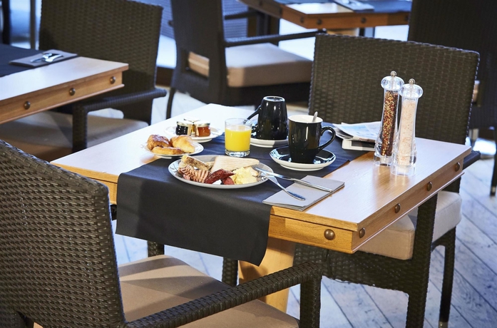 Imagen del bar/restaurante del Hotel Golden Tulip Villa Massalia. Foto 4