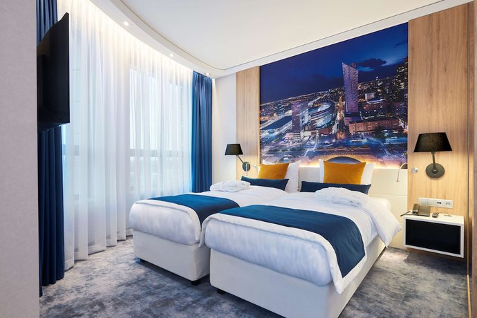 Imagen de la habitación del Hotel Golden Tulip Warsaw Airport. Foto 9