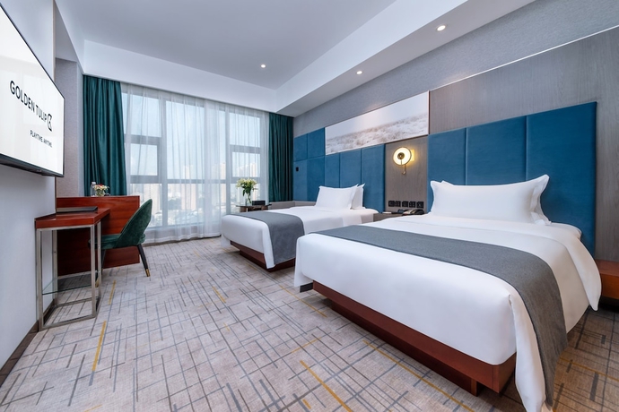 Imagen de la habitación del Hotel Golden Tulip Wuhan Wangjiawan. Foto 5