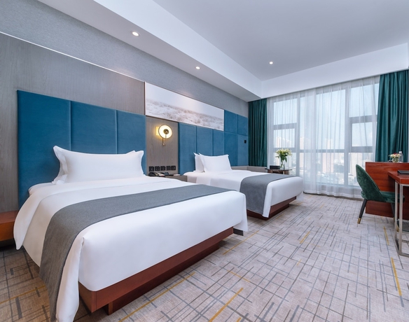 Imagen de la habitación del Hotel Golden Tulip Wuhan Wangjiawan. Foto 10