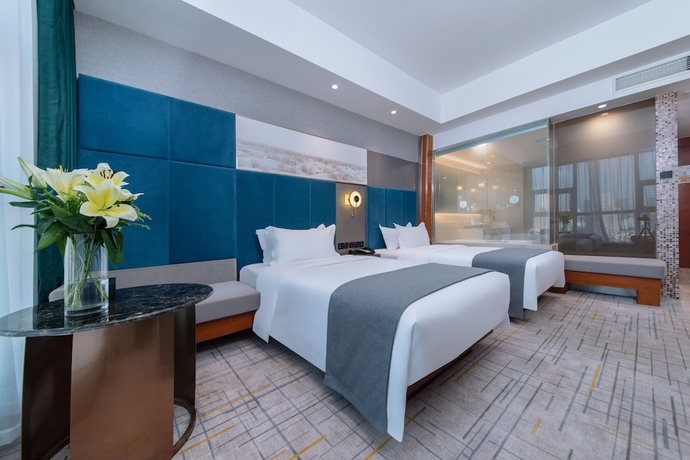 Imagen de la habitación del Hotel Golden Tulip Wuhan Wangjiawan. Foto 11