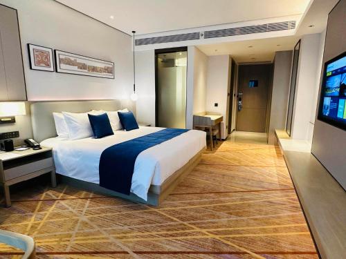 Imagen de la habitación del Hotel Golden Tulip Xuzhou Huaihai. Foto 20
