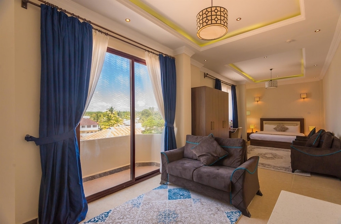 Imagen de la habitación del Hotel Golden Tulip Zanzibar Resort. Foto 11