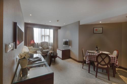 Imagen de la habitación del Hotel Golden View, Chongqing. Foto 8