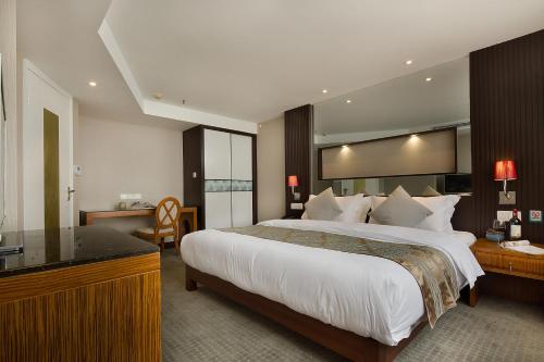 Imagen de la habitación del Hotel Golden View, Chongqing. Foto 9