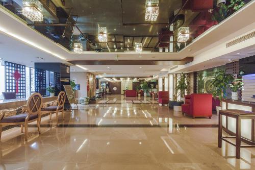 Imagen de la habitación del Hotel Golden View, Chongqing. Foto 10