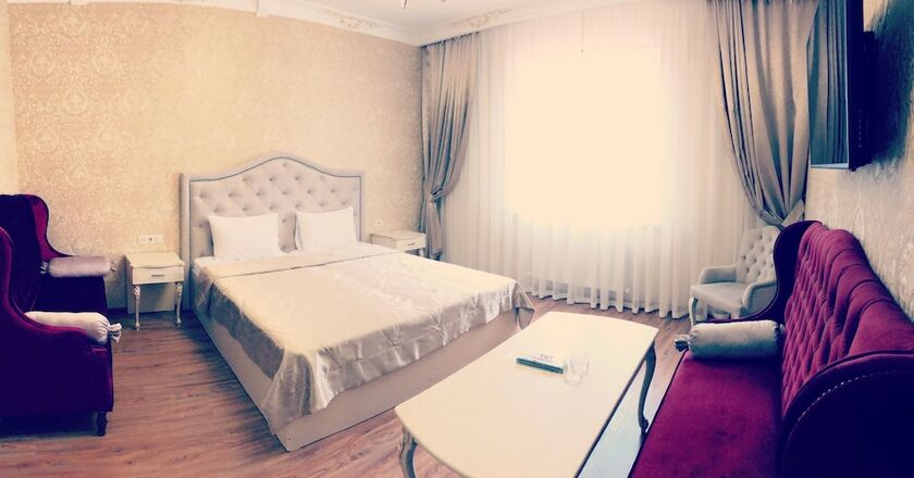 Imagen de la habitación del Hotel Golden Villa. Foto 16