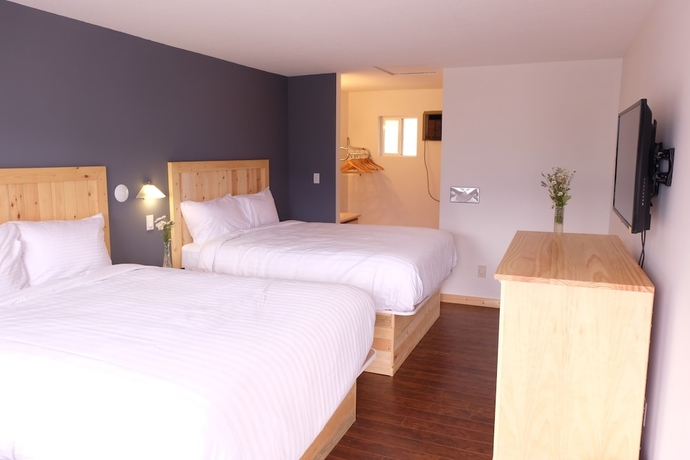 Imagen de la habitación del Hotel Golden Village Lodge. Foto 13