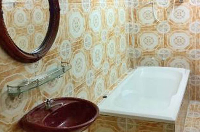 Imagen de la habitación del Hotel Golden World Guesthouse. Foto 10