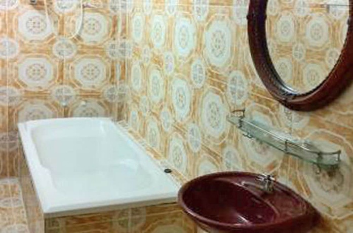 Imagen de la habitación del Hotel Golden World Guesthouse. Foto 11