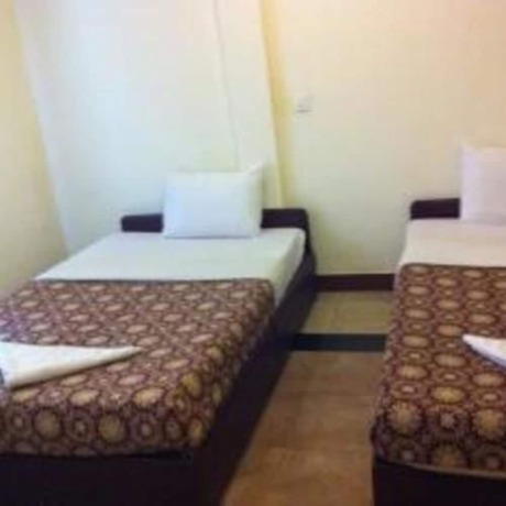 Imagen de la habitación del Hotel Golden World Guesthouse. Foto 12