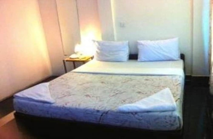 Imagen de la habitación del Hotel Golden World Guesthouse. Foto 14