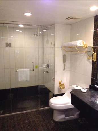 Imagen de la habitación del Hotel Golden Zone Hotel - Xishuangbanna. Foto 2
