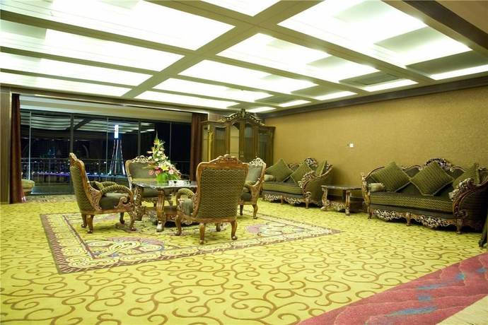 Imagen de la habitación del Hotel Golden Zone Hotel - Xishuangbanna. Foto 6