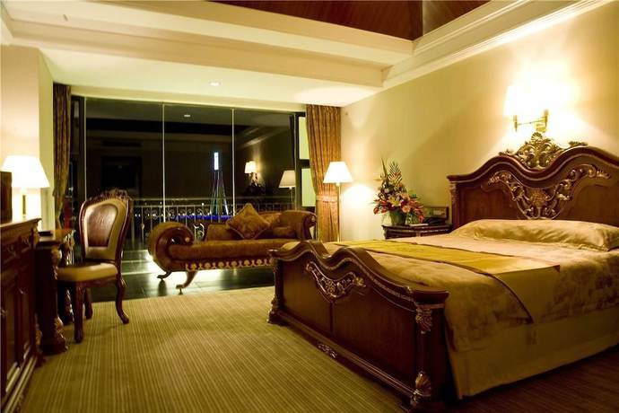 Imagen de la habitación del Hotel Golden Zone Hotel - Xishuangbanna. Foto 8