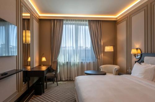 Imagen de la habitación del Hotel GoldenEye & Casino. Foto 19