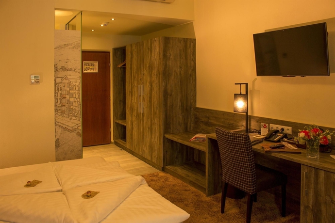 Imagen de la habitación del Hotel Goldener Adler, BW Signature Collection. Foto 8