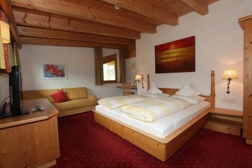 Imagen de la habitación del Hotel Goldener Adler, Curon Venosta. Foto 2