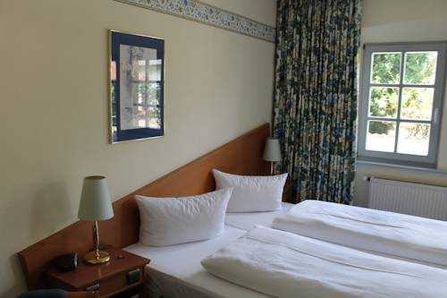 Imagen de la habitación del Hotel Goldener Adler, Hallstadt. Foto 5