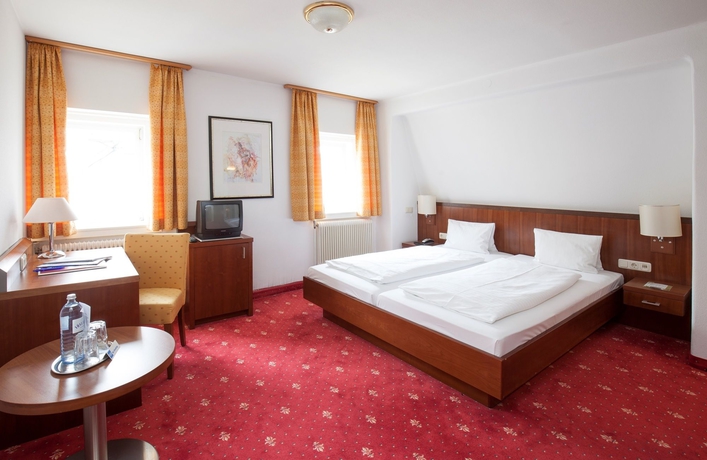 Imagen de la habitación del Hotel Goldener Brunnen. Foto 8