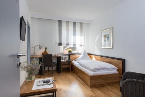 Imagen de la habitación del Hotel Goldener Engel. Foto 7