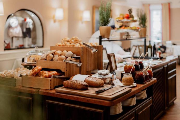 Imagen del bar/restaurante del Hotel Goldener Hirsch, A Luxury Collection, Salzburg. Foto 6