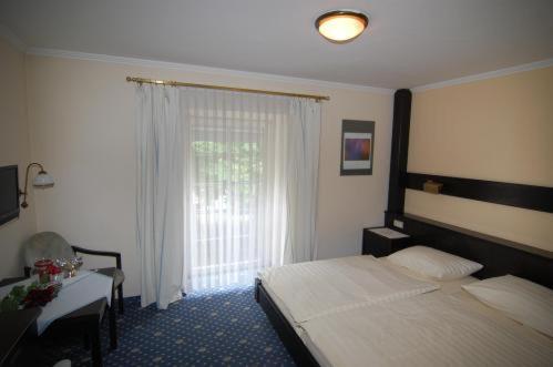 Imagen de la habitación del Hotel Goldener Hirsch, Reutte. Foto 5