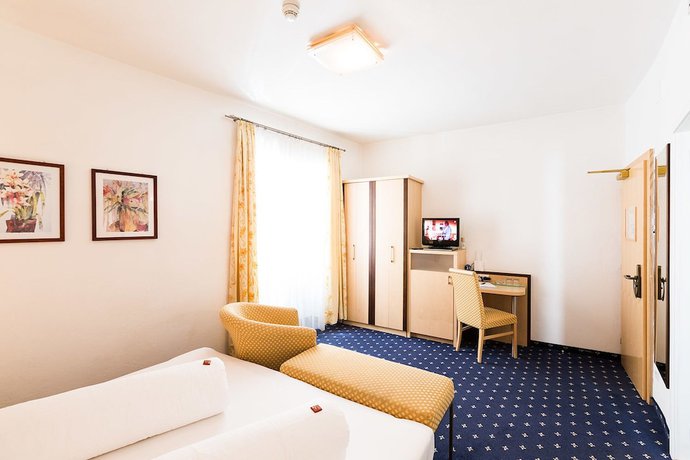 Imagen de la habitación del Hotel Goldener Stern, Mitterdorf - Caldaro di Mezzo. Foto 3